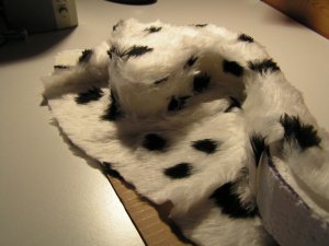 A test section of shaped polystyrene lined with fake dalmation fur, show from the side